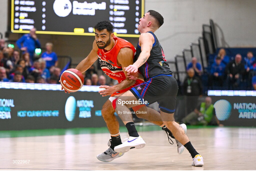 18 January 2025; Kason Harrell of Killester in action against Kyle Hosford of UCC Demons during the Basketball Ireland Men's Pat Duffy National Cup final match between Killester and UCC Demons at the National Basketball Arena in Tallaght, Dublin. Photo by Shauna Clinton/Sportsfile