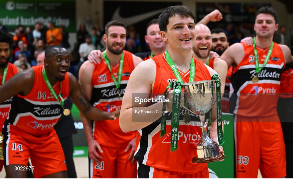 18 January 2025; Killester captain Ciaran Roe with the Pat Duffy Cup after his side's victory in the Basketball Ireland Men's Pat Duffy National Cup final match between Killester and UCC Demons at the National Basketball Arena in Tallaght, Dublin. Photo by Shauna Clinton/Sportsfile