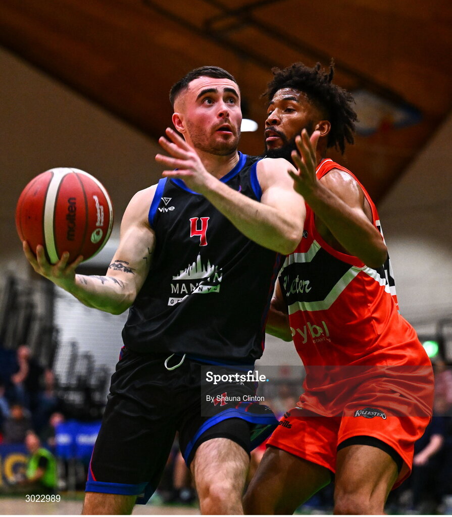 18 January 2025; Scott Hannigan of UCC Demons in action against Isiah Dasher of Killester during the Basketball Ireland Men's Pat Duffy National Cup final match between Killester and UCC Demons at the National Basketball Arena in Tallaght, Dublin. Photo by Shauna Clinton/Sportsfile