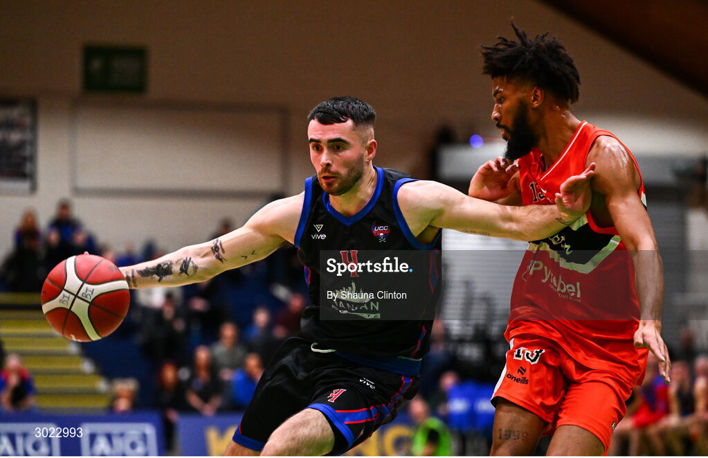 18 January 2025; Scott Hannigan of UCC Demons in action against Isiah Dasher of Killester during the Basketball Ireland Men's Pat Duffy National Cup final match between Killester and UCC Demons at the National Basketball Arena in Tallaght, Dublin. Photo by Shauna Clinton/Sportsfile