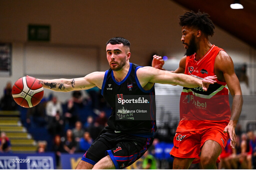 18 January 2025; Scott Hannigan of UCC Demons in action against Isiah Dasher of Killester during the Basketball Ireland Men's Pat Duffy National Cup final match between Killester and UCC Demons at the National Basketball Arena in Tallaght, Dublin. Photo by Shauna Clinton/Sportsfile