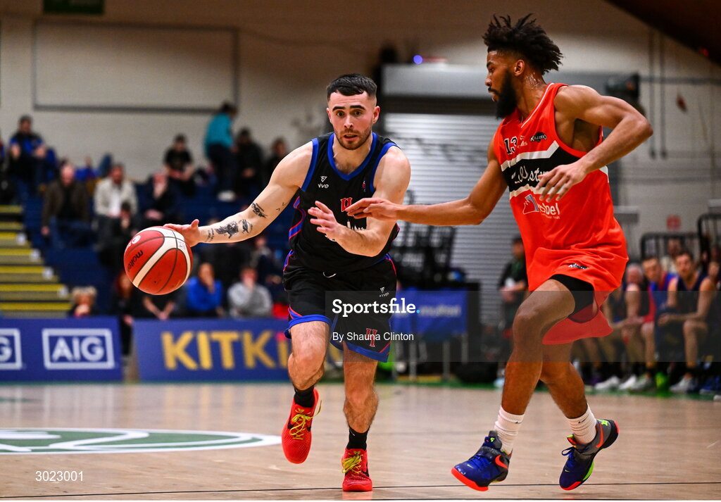 18 January 2025; Scott Hannigan of UCC Demons in action against Isiah Dasher of Killester during the Basketball Ireland Men's Pat Duffy National Cup final match between Killester and UCC Demons at the National Basketball Arena in Tallaght, Dublin. Photo by Shauna Clinton/Sportsfile