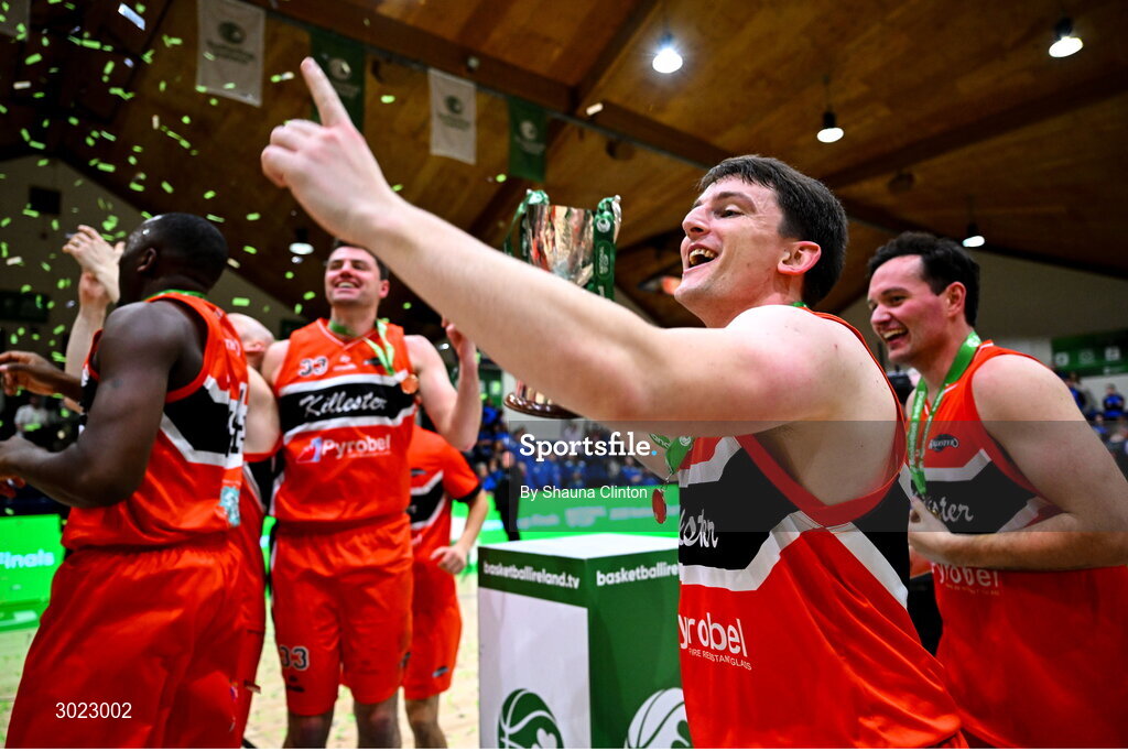 18 January 2025; Killester captain Ciaran Roe, centre, celebrates with team-mates after their side's victory in the Basketball Ireland Men's Pat Duffy National Cup final match between Killester and UCC Demons at the National Basketball Arena in Tallaght, Dublin. Photo by Shauna Clinton/Sportsfile