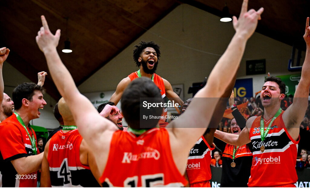 18 January 2025; Isiah Dasher of Killester, centre, celebrates with team-mates after their side's victory in the Basketball Ireland Men's Pat Duffy National Cup final match between Killester and UCC Demons at the National Basketball Arena in Tallaght, Dublin. Photo by Shauna Clinton/Sportsfile