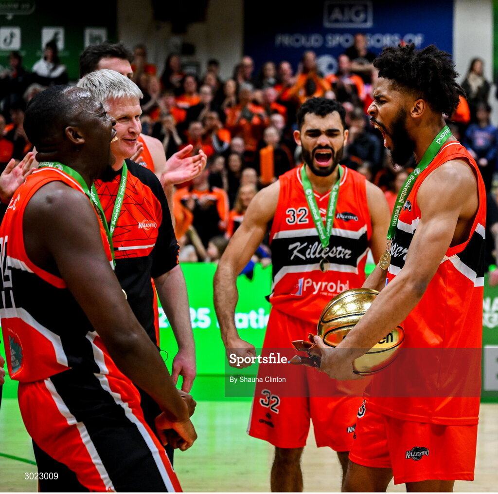 18 January 2025; Isiah Dasher of Killester, right, celebrates with team-mates after their side's victory in the Basketball Ireland Men's Pat Duffy National Cup final match between Killester and UCC Demons at the National Basketball Arena in Tallaght, Dublin. Photo by Shauna Clinton/Sportsfile