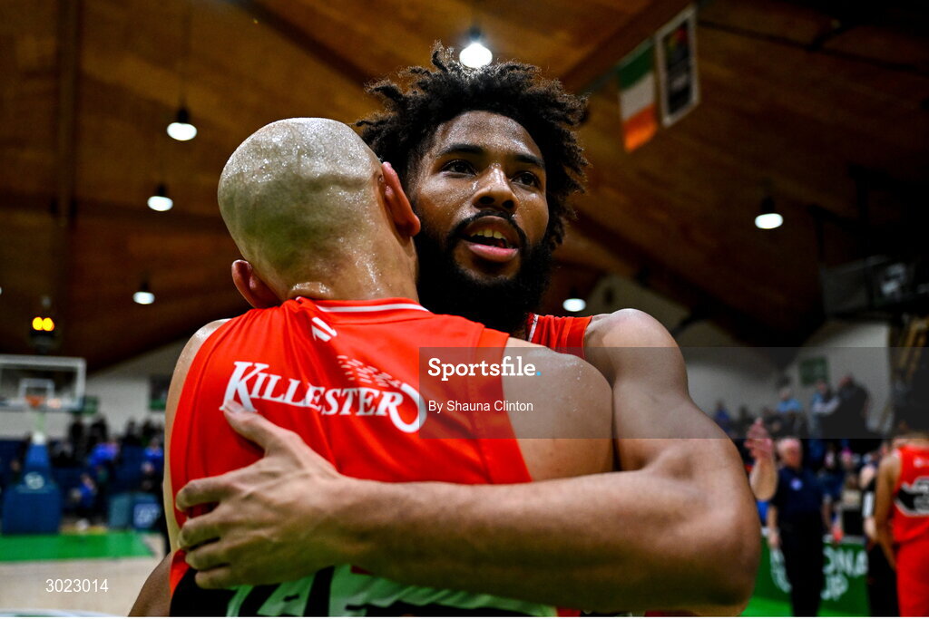 18 January 2025; Killester players Isiah Dasher, right, and Paul Dick celebrate after their side's victory in the Basketball Ireland Men's Pat Duffy National Cup final match between Killester and UCC Demons at the National Basketball Arena in Tallaght, Dublin. Photo by Shauna Clinton/Sportsfile