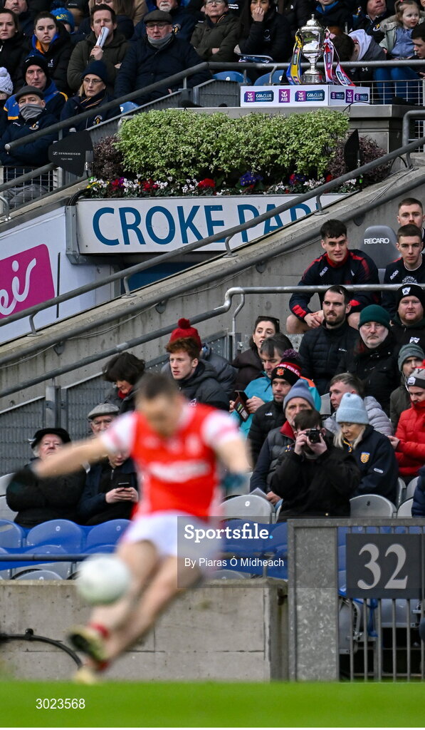 19 January 2025; A general view of the Andy Merrigan Cup as Con O'Callaghan of Cuala takes a free during the AIB GAA Football All-Ireland Senior Club Championship final match between Cuala and Errigal Ciarán at Croke Park in Dublin. Photo by Piaras Ó Mídheach/Sportsfile
