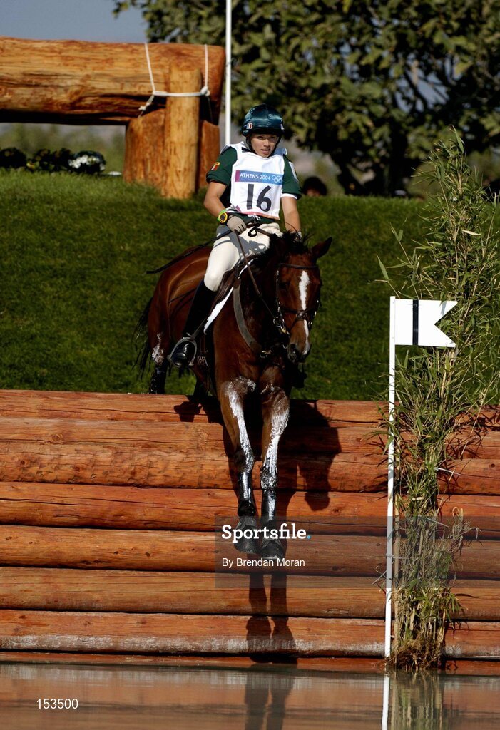 17 August 2004; Ireland's Sasha Harrison, on All Love Du Fenaud, at the water jump during the Cross Country discipline of the 3 Day Eventing Competition. Markopoulo Olympic Equestrian Centre. Games of the XXVIII Olympiad, Athens Summer Olympics Games 2004, Athens, Greece. Picture credit; Brendan Moran / SPORTSFILE