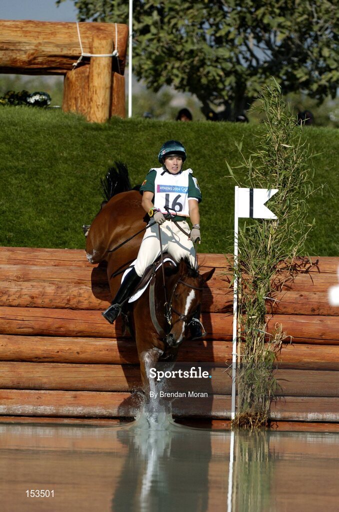 17 August 2004; Ireland's Sasha Harrison, on All Love Du Fenaud, at the water jump during the Cross Country discipline of the 3 Day Eventing Competition. Markopoulo Olympic Equestrian Centre. Games of the XXVIII Olympiad, Athens Summer Olympics Games 2004, Athens, Greece. Picture credit; Brendan Moran / SPORTSFILE