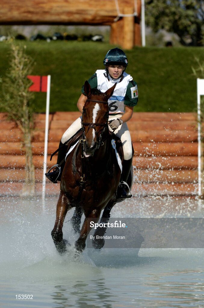 17 August 2004; Ireland's Sasha Harrison, on All Love Du Fenaud, at the water jump during the Cross Country discipline of the 3 Day Eventing Competition. Markopoulo Olympic Equestrian Centre. Games of the XXVIII Olympiad, Athens Summer Olympics Games 2004, Athens, Greece. Picture credit; Brendan Moran / SPORTSFILE