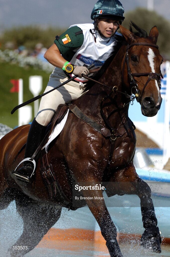 17 August 2004; Ireland's Sasha Harrison, on All Love Du Fenaud, at the water jump during the Cross Country discipline of the 3 Day Eventing Competition. Markopoulo Olympic Equestrian Centre. Games of the XXVIII Olympiad, Athens Summer Olympics Games 2004, Athens, Greece. Picture credit; Brendan Moran / SPORTSFILE