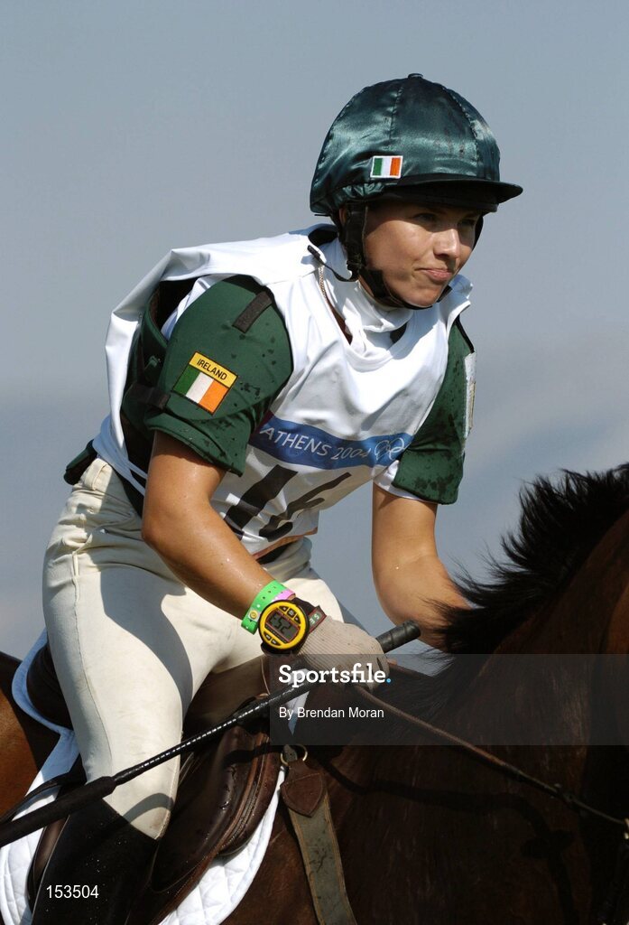 17 August 2004; Ireland's Sasha Harrison, on All Love Du Fenaud, at the water jump during the Cross Country discipline of the 3 Day Eventing Competition. Markopoulo Olympic Equestrian Centre. Games of the XXVIII Olympiad, Athens Summer Olympics Games 2004, Athens, Greece. Picture credit; Brendan Moran / SPORTSFILE