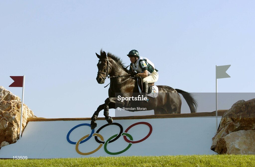17 August 2004; Ireland's Susan Shortt, on Just Beauty Queen, clear the 30th fence, during the Cross Country discipline of the 3 Day Eventing Competition. Markopoulo Olympic Equestrian Centre. Games of the XXVIII Olympiad, Athens Summer Olympics Games 2004, Athens, Greece. Picture credit; Brendan Moran / SPORTSFILE