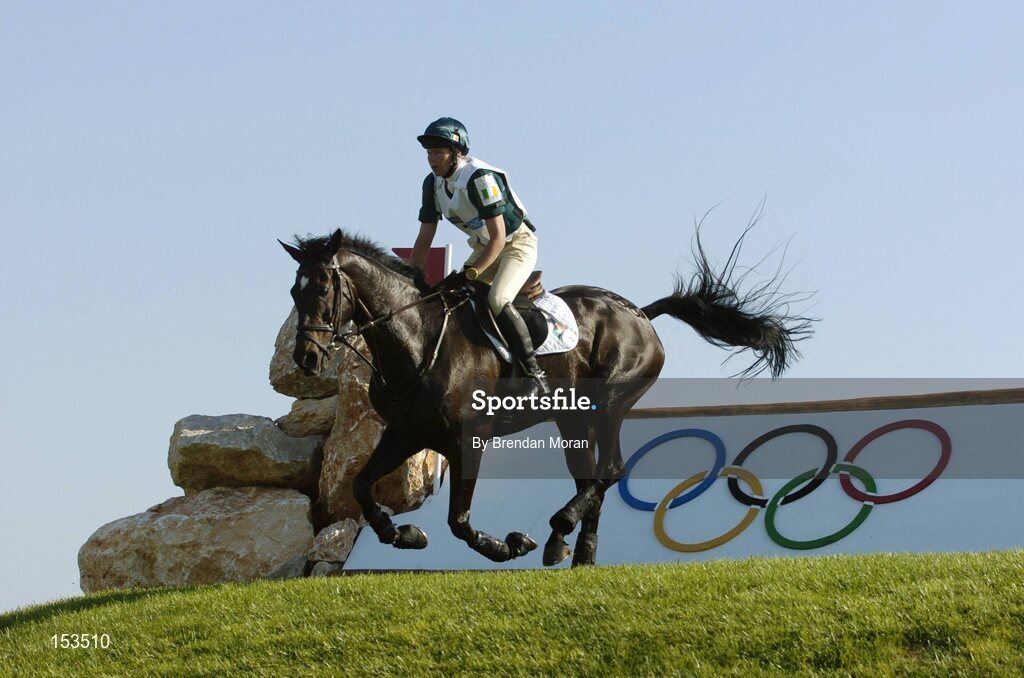 17 August 2004; Ireland's Susan Shortt, on Just Beauty Queen, clears the 30th fence, during the Cross Country discipline of the 3 Day Eventing Competition. Markopoulo Olympic Equestrian Centre. Games of the XXVIII Olympiad, Athens Summer Olympics Games 2004, Athens, Greece. Picture credit; Brendan Moran / SPORTSFILE