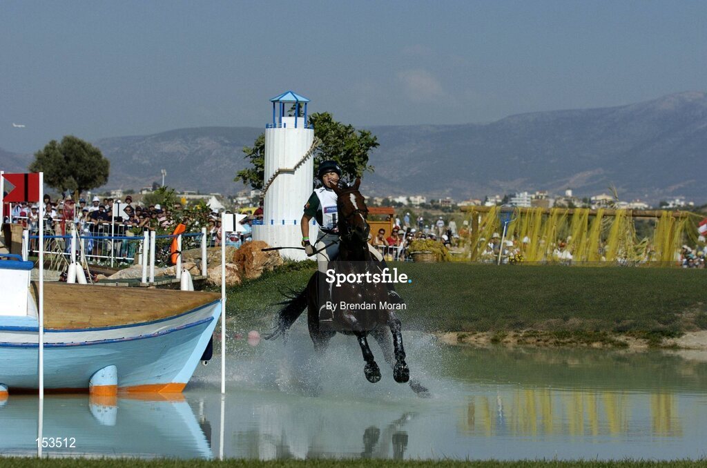 17 August 2004; Ireland's Sasha Harrison, on All Love Du Fenaud, fails to negotiate the boat fence at the water jump during the Cross Country discipline of the 3 Day Eventing Competition. Markopoulo Olympic Equestrian Centre. Games of the XXVIII Olympiad, Athens Summer Olympics Games 2004, Athens, Greece. Picture credit; Brendan Moran / SPORTSFILE