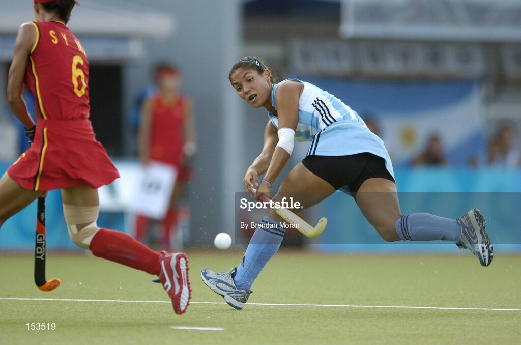 26 August 2004; Agustina Garcia, Argentina, in action against Mai Shaoyan, China. Bronze Medal Match, Argentina v China, Olympic Hockey Centre, Helliniko Sports Complex. Games of the XXVIII Olympiad, Athens Summer Olympics Games 2004, Athens, Greece. Picture credit; Brendan Moran / SPORTSFILE