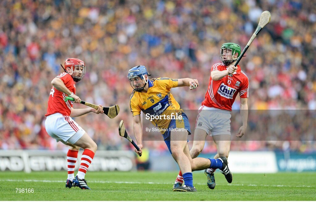 28 September 2013; Conor Ryan, Clare, in action against Seamus Harnedy and Stephen Moylan, left, Cork. GAA Hurling All-Ireland Senior Championship Final Replay, Cork v Clare, Croke Park, Dublin. Picture credit: Stephen McCarthy / SPORTSFILE