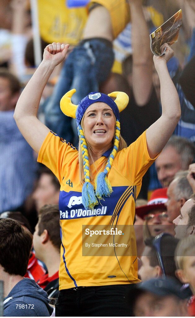 28 September 2013; A Clare supporter celebrates a score. GAA Hurling All-Ireland Senior Championship Final Replay, Cork v Clare, Croke Park, Dublin. Picture credit: Stephen McCarthy / SPORTSFILE