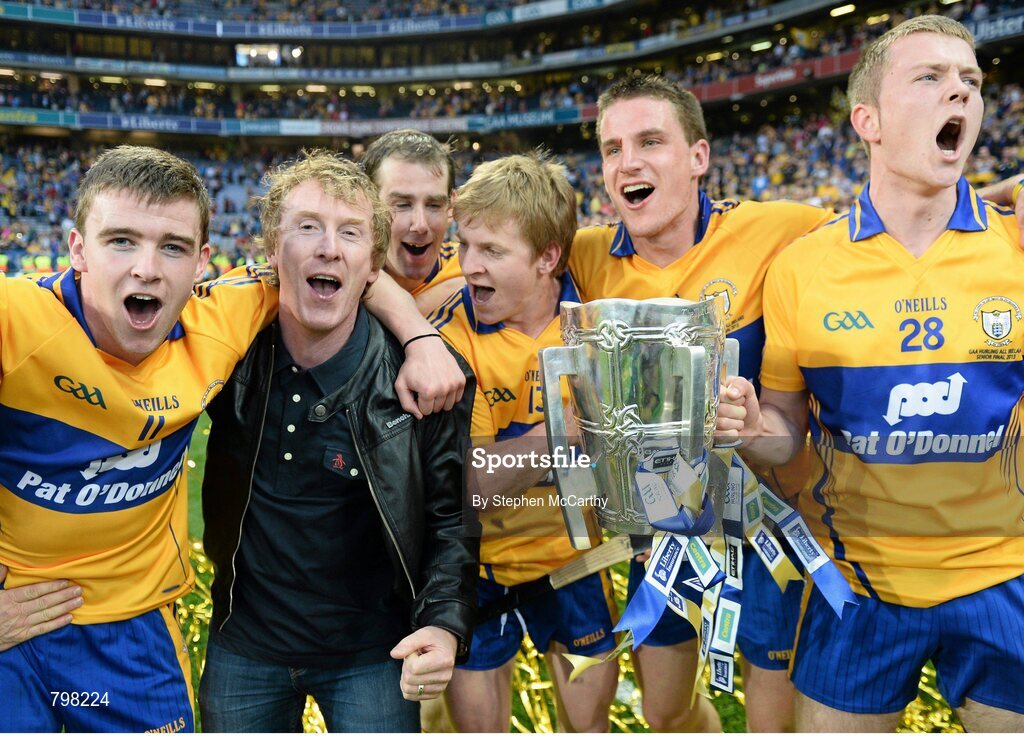 28 September 2013; Hector Ó hEochagáin celebrates with Clare players following their victory. GAA Hurling All-Ireland Senior Championship Final Replay, Cork v Clare, Croke Park, Dublin. Picture credit: Stephen McCarthy / SPORTSFILE