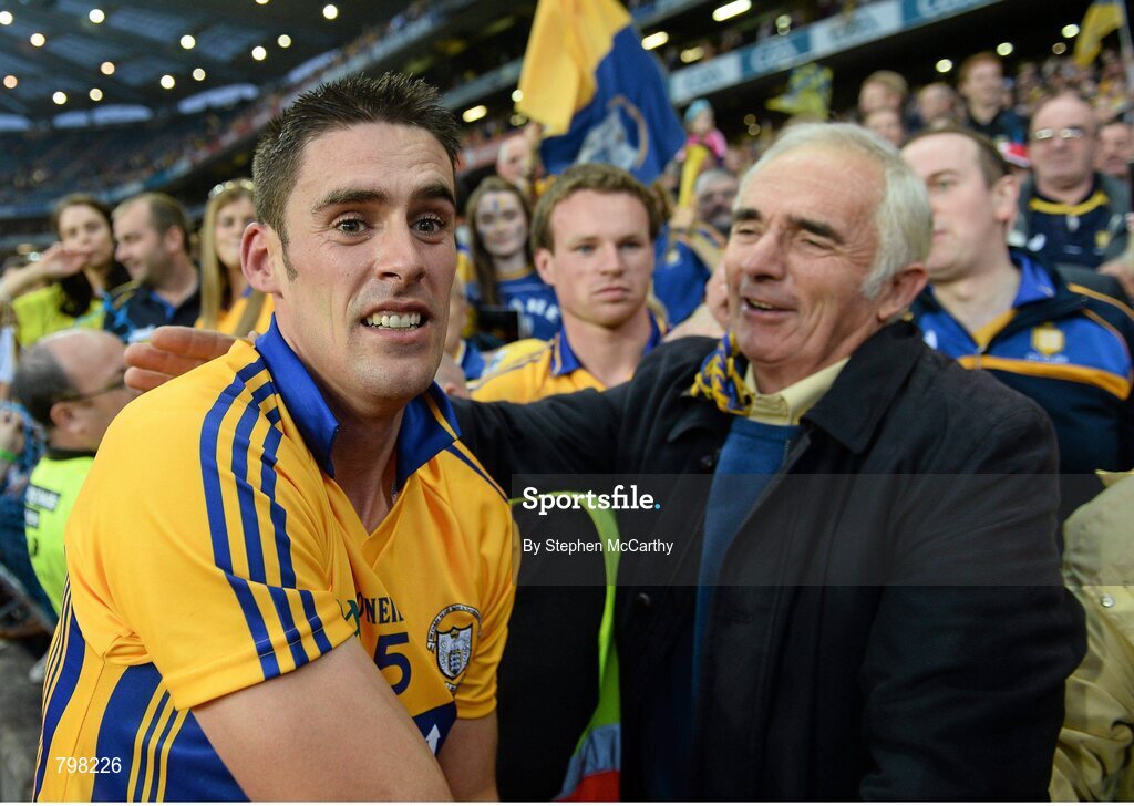 28 September 2013; Brendan Bugler, Clare, is congratulated by his father Seamus following his side's victory. GAA Hurling All-Ireland Senior Championship Final Replay, Cork v Clare, Croke Park, Dublin. Picture credit: Stephen McCarthy / SPORTSFILE