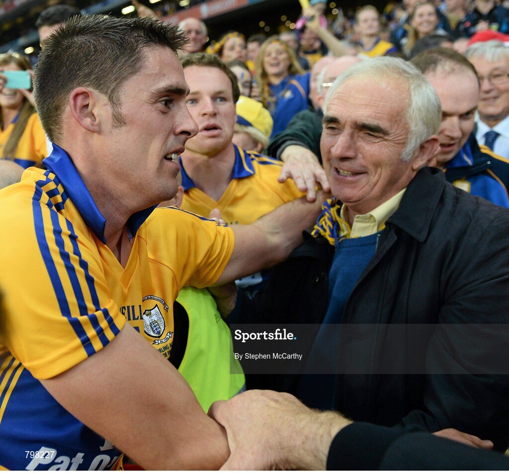 28 September 2013; Brendan Bugler, Clare, is congratulated by his father Seamus following his side's victory. GAA Hurling All-Ireland Senior Championship Final Replay, Cork v Clare, Croke Park, Dublin. Picture credit: Stephen McCarthy / SPORTSFILE
