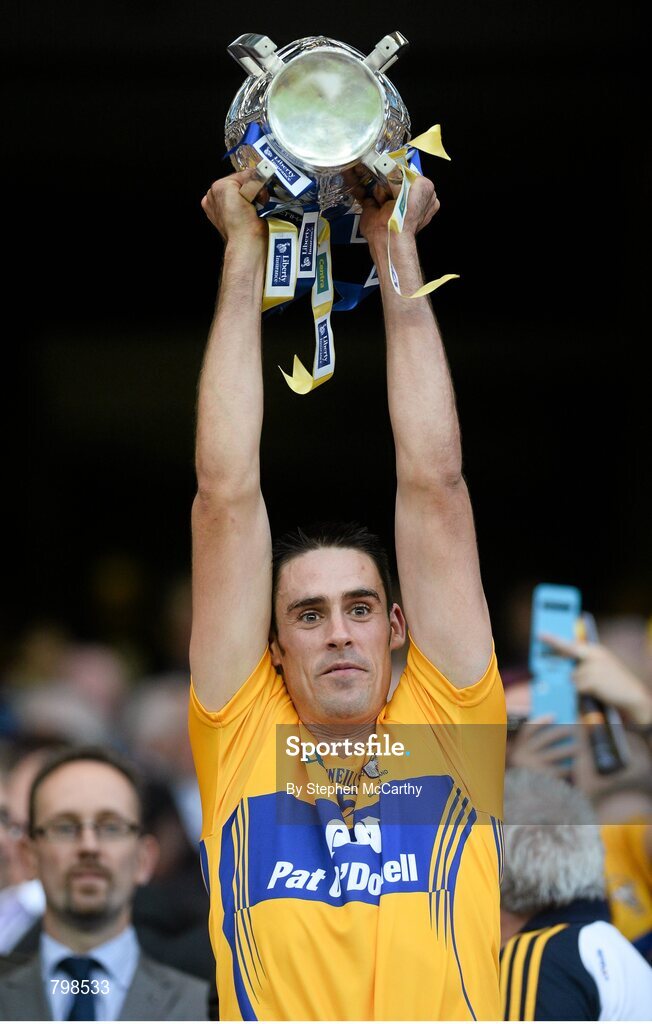 28 September 2013; Brendan Bugler, Clare, lifts the Liam MacCarthy cup. GAA Hurling All-Ireland Senior Championship Final Replay, Cork v Clare, Croke Park, Dublin. Picture credit: Stephen McCarthy / SPORTSFILE