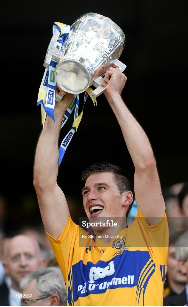 28 September 2013; Conor Ryan, Clare, lifts the Liam MacCarthy cup. GAA Hurling All-Ireland Senior Championship Final Replay, Cork v Clare, Croke Park, Dublin. Picture credit: Stephen McCarthy / SPORTSFILE