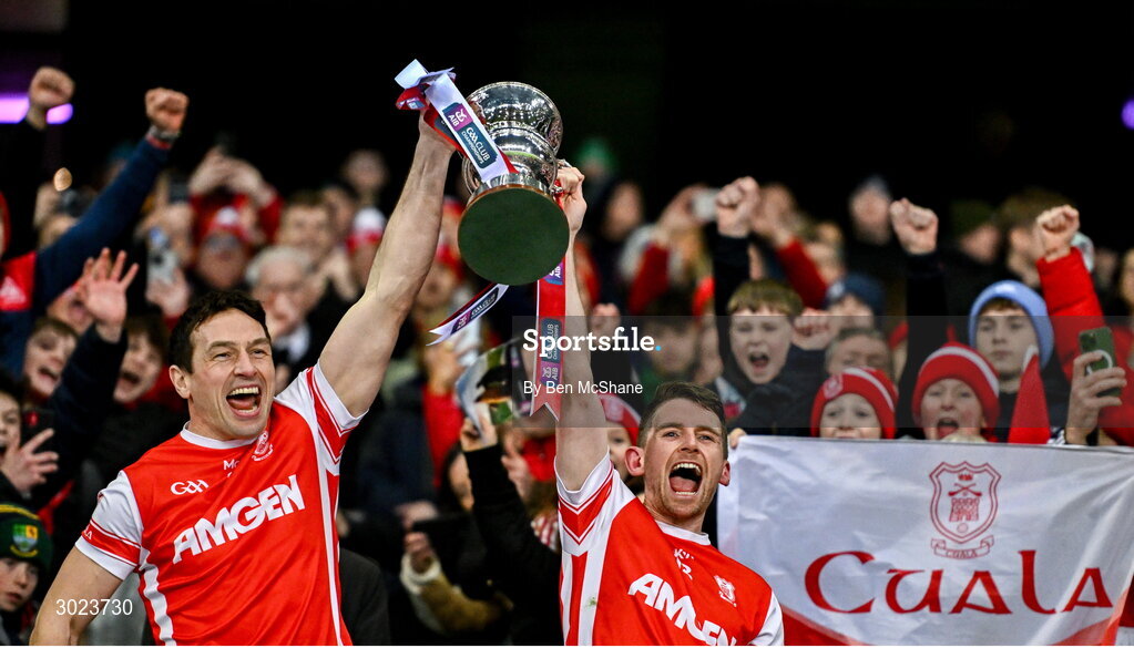 19 January 2025; Cuala captain James Power, left, Luke Keating of Cuala lift the Andy Merrigan Cup after their side's victory in the AIB GAA Football All-Ireland Senior Club Championship final match between Cuala and Errigal Ciarán at Croke Park in Dublin. Photo by Ben McShane/Sportsfile