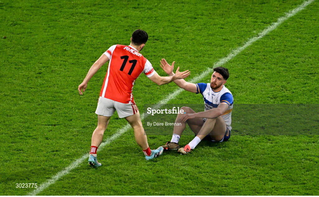 19 January 2025; Conor O'Brien of Cuala shakes hands with Joe Oguz of Errigal Ciarán after the AIB GAA Football All-Ireland Senior Club Championship final match between Cuala and Errigal Ciarán at Croke Park in Dublin. Photo by Daire Brennan/Sportsfile
