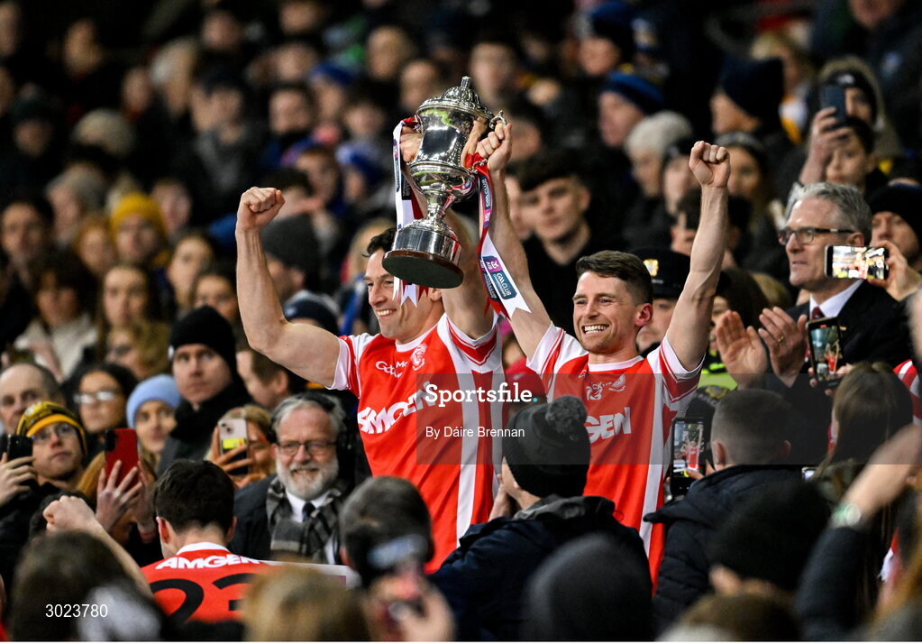 19 January 2025; Cuala captains James Power, left, and Luke Keating lift the Andy Merrigan cup after the AIB GAA Football All-Ireland Senior Club Championship final match between Cuala and Errigal Ciarán at Croke Park in Dublin. Photo by Daire Brennan/Sportsfile