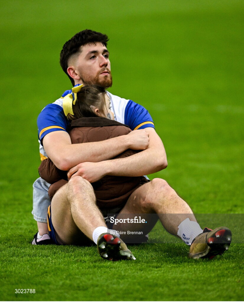 19 January 2025; A dejected Joe Oguz of Errigal Ciarán with his daughter Ada, aged 3, after the AIB GAA Football All-Ireland Senior Club Championship final match between Cuala and Errigal Ciarán at Croke Park in Dublin. Photo by Daire Brennan/Sportsfile