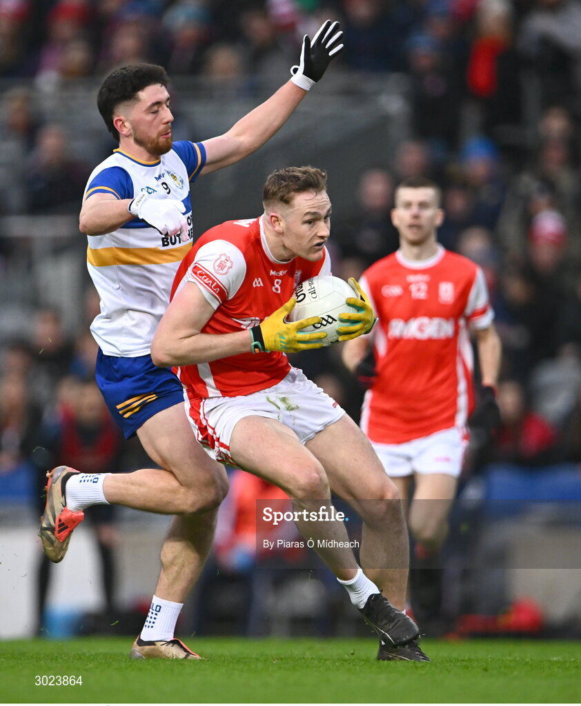 19 January 2025; Peadar Ó Cofaigh Byrne of Cuala in action against Joe Oguz of Errigal Ciarán during the AIB GAA Football All-Ireland Senior Club Championship final match between Cuala and Errigal Ciarán at Croke Park in Dublin. Photo by Piaras Ó Mídheach/Sportsfile