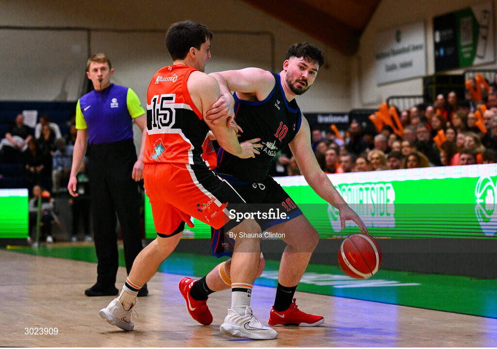 18 January 2025; David Lehane of UCC Demons is tackled by Ciaran Roe of Killester during the Basketball Ireland Men's Pat Duffy National Cup final match between Killester and UCC Demons at the National Basketball Arena in Tallaght, Dublin. Photo by Shauna Clinton/Sportsfile