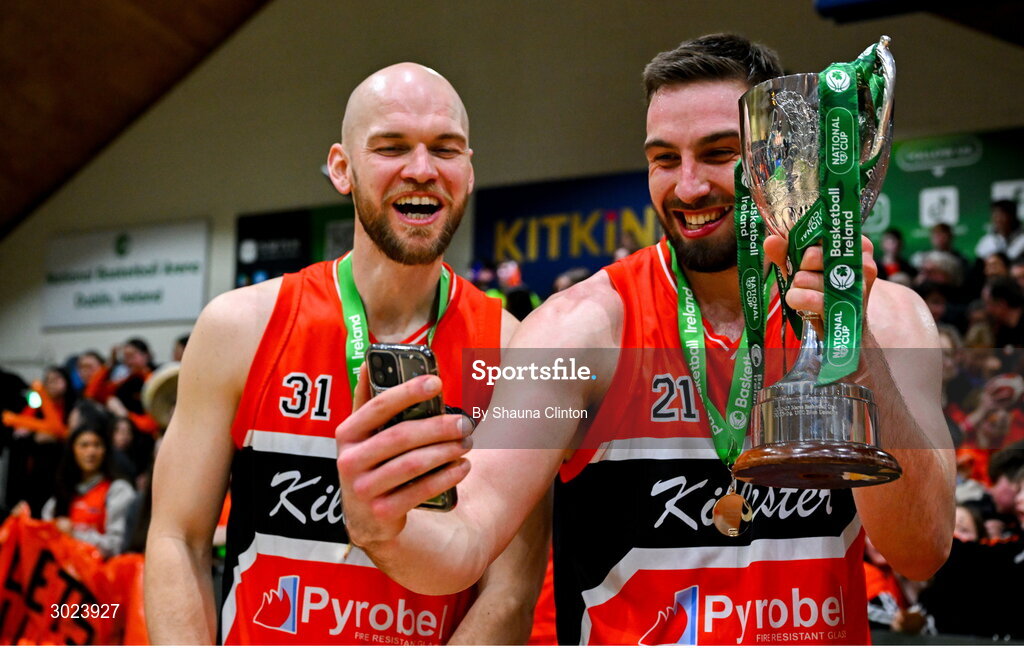 18 January 2025; Baptiste Chazelas of Killester, right, and team-mate Paul Dick celebrate after their side's victory in the Basketball Ireland Men's Pat Duffy National Cup final match between Killester and UCC Demons at the National Basketball Arena in Tallaght, Dublin. Photo by Shauna Clinton/Sportsfile
