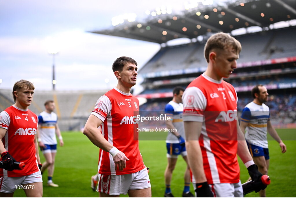 19 January 2025; Cuala players, from left, Eoghan O'Callaghan, Michael Fitzsimons and Danny Conroy in the parade before the AIB GAA Football All-Ireland Senior Club Championship final match between Cuala and Errigal Ciarán at Croke Park in Dublin. Photo by Piaras Ó Mídheach/Sportsfile