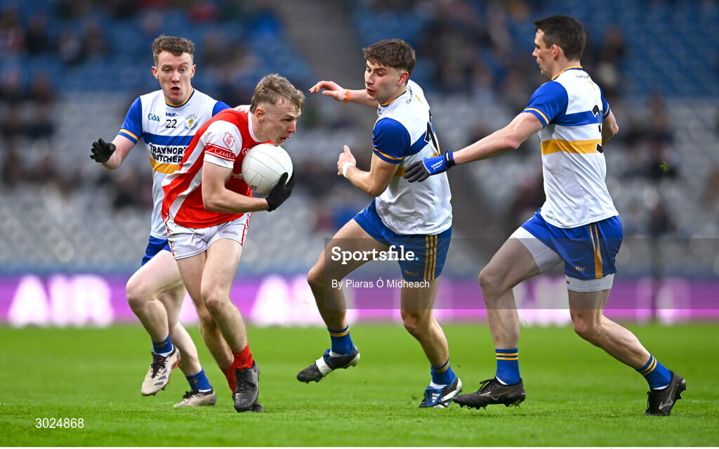 19 January 2025; Danny Conroy of Cuala in action against Errigal Ciarán players, from left, Mark Kavanagh, Odhran Robinson and Aidan McCrory during the AIB GAA Football All-Ireland Senior Club Championship final match between Cuala and Errigal Ciarán at Croke Park in Dublin. Photo by Piaras Ó Mídheach/Sportsfile