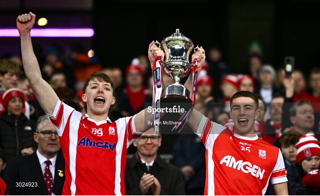 19 January 2025; Cuala players Dan O'Sullivan, left, and Liam Fitzgerald lift the Andy Merrigan Cup after their side's victory in the the AIB GAA Football All-Ireland Senior Club Championship final match between Cuala and Errigal Ciarán at Croke Park in Dublin. Photo by Ben McShane/Sportsfile
