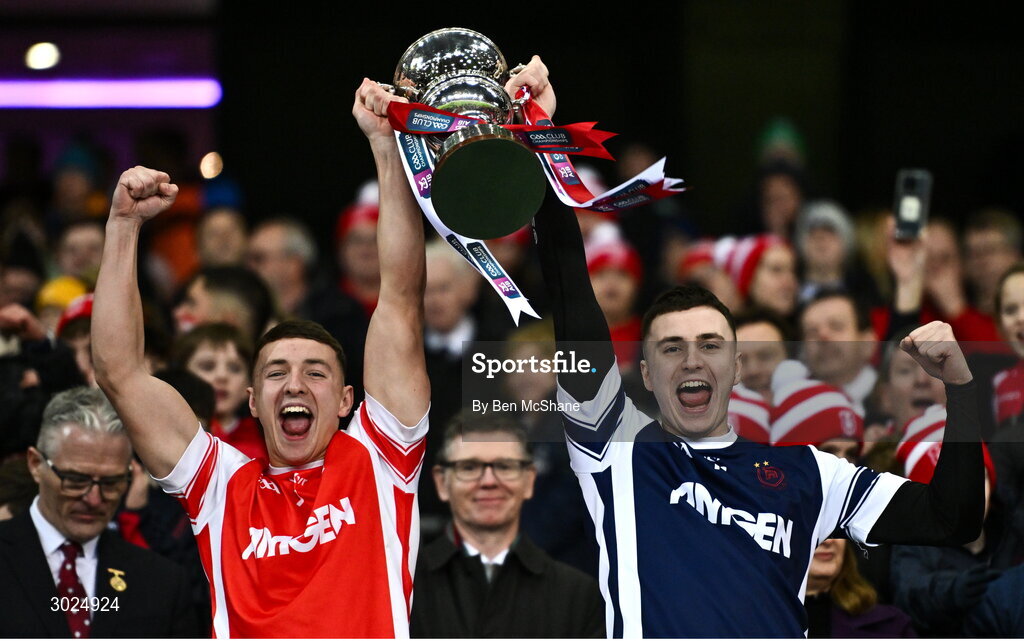 19 January 2025; Cuala players David O'Dowd, left, and goalkeeper Darragh O'Dowd lift the Andy Merrigan Cup after their side's victory in the the AIB GAA Football All-Ireland Senior Club Championship final match between Cuala and Errigal Ciarán at Croke Park in Dublin. Photo by Ben McShane/Sportsfile