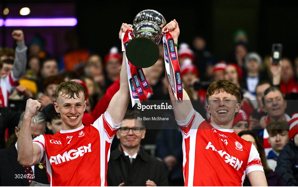 19 January 2025; Cuala players Danny Conroy, left, and Jamie Conroy lift the Andy Merrigan Cup after their side's victory in the the AIB GAA Football All-Ireland Senior Club Championship final match between Cuala and Errigal Ciarán at Croke Park in Dublin. Photo by Ben McShane/Sportsfile