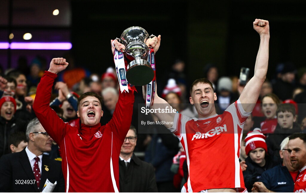 19 January 2025; Cuala players Darach Ó Cofaigh Byrne, left, and Peadar Ó Cofaigh Byrne lift the Andy Merrigan Cup after their side's victory in the the AIB GAA Football All-Ireland Senior Club Championship final match between Cuala and Errigal Ciarán at Croke Park in Dublin. Photo by Ben McShane/Sportsfile