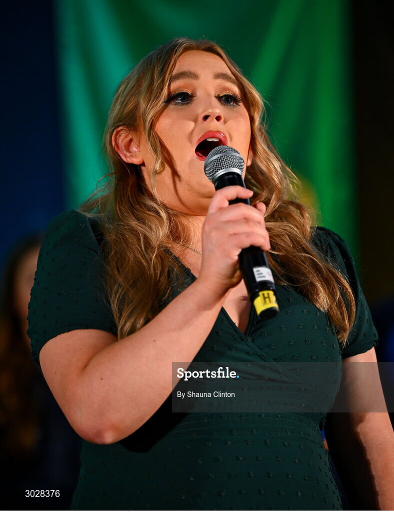 25 January 2025; Katie Boyle sings Amhrán na bhFiann before the the Scór na nÓg 2024-25 All-Ireland Finals at the Hillgrove Hotel, Monaghan. Photo by Shauna Clinton/Sportsfile