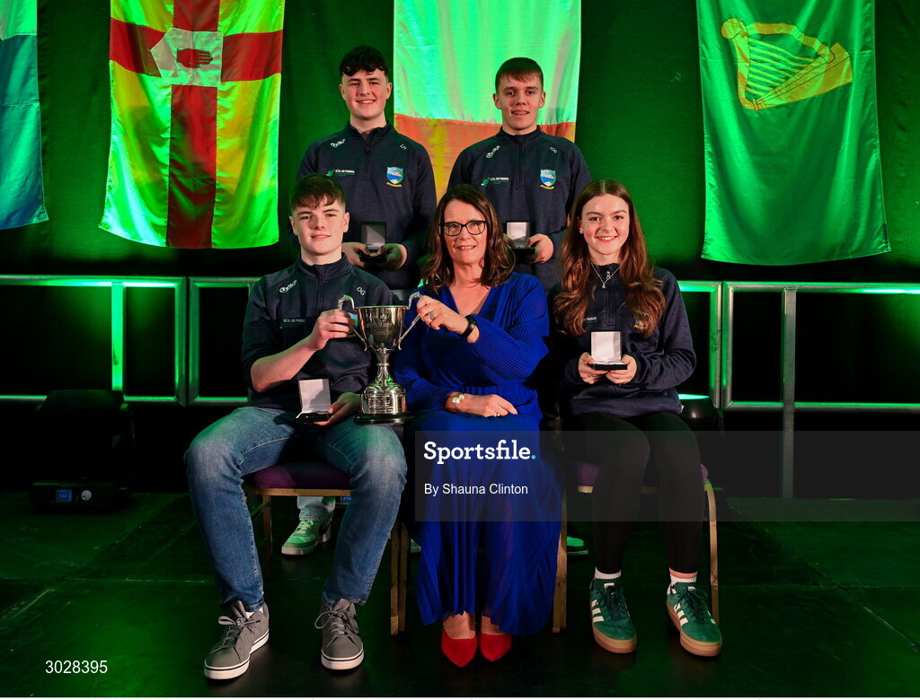 25 January 2025; Winners of the Tráth na gCeist competition, The Naomh Columba team, including Fearghaill Ó Gadhra, Oisin Mac Giolla Easpaig, Laoise Nic Fhionn and Liam Ó hArdaigh, representing Donegal and Ulster, with Cathaoirleach Coiste Náisiúnta Scór Paula Magee during the Scór na nÓg 2024-25 All-Ireland Finals at the Hillgrove Hotel, Monaghan. Photo by Shauna Clinton/Sportsfile