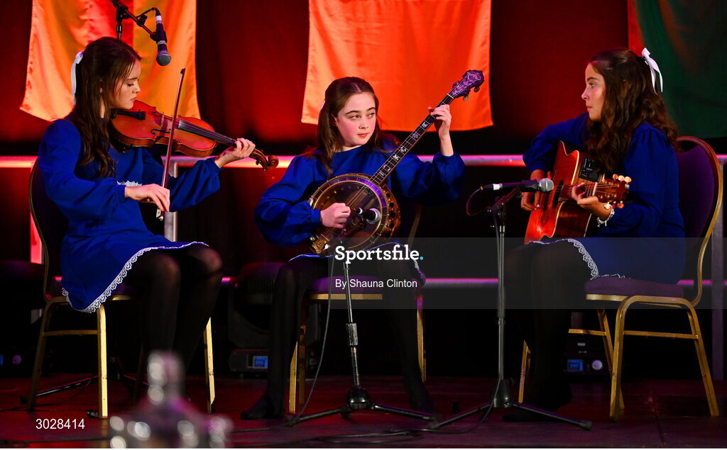 25 January 2025; The Bun Brosnaí team, including Aoife Dunleavy, Anna Dunleavy and Béibhinn McGowan, representing Westmeath and Leinster, in the Ceol Uirlise competition during the Scór na nÓg 2024-25 All-Ireland Finals at the Hillgrove Hotel, Monaghan. Photo by Shauna Clinton/Sportsfile