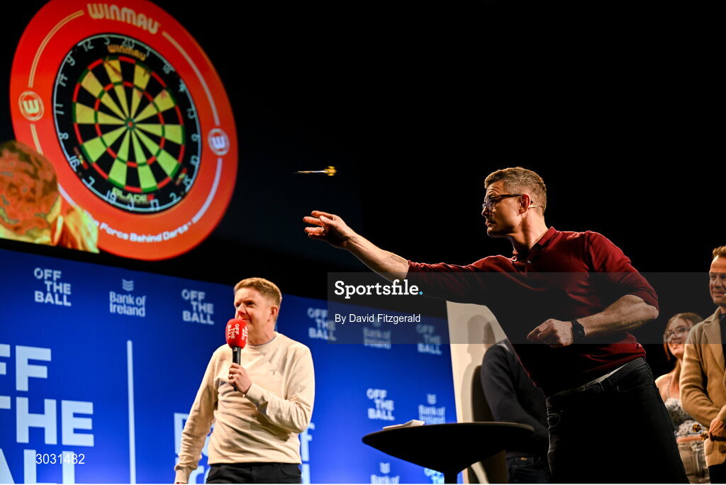 29 January 2025; Former Ireland and Leinster rugby player Brian O'Driscoll playing darts during a special Off the Ball Roadshow event at the Olympia Theatre in Dublin. Photo by David Fitzgerald/Sportsfile