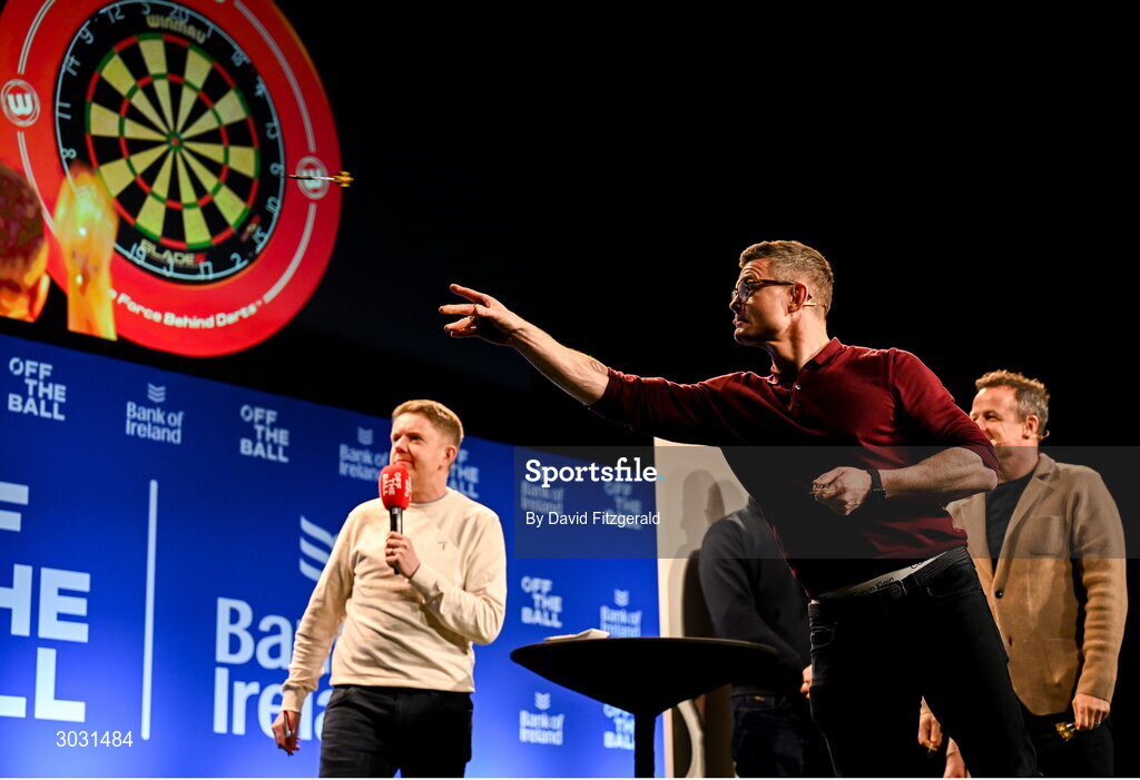 29 January 2025; Former Ireland and Leinster rugby player Brian O'Driscoll playing darts during a special Off the Ball Roadshow event at the Olympia Theatre in Dublin. Photo by David Fitzgerald/Sportsfile