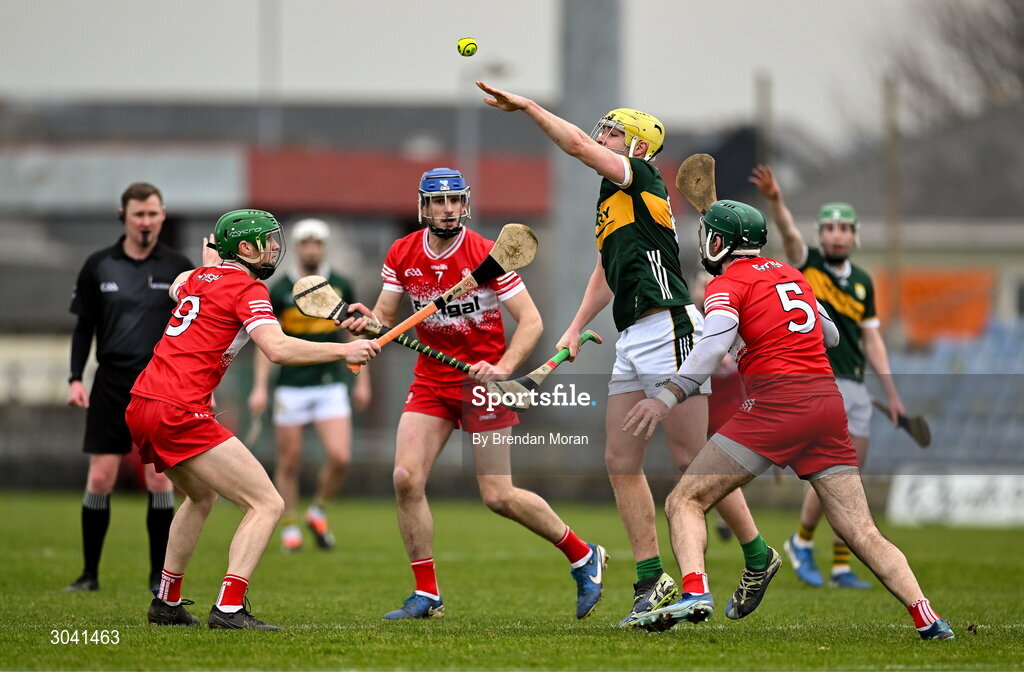9 February 2025; Tom Doyle of Kerry in action against Derry players, from left, Ryan McGill, Thomas Brady and Sean Cassidy during the Allianz Hurling League Division 2 match between Kerry and Derry at Austin Stack Park in Tralee, Kerry. Photo by Brendan Moran/Sportsfile
