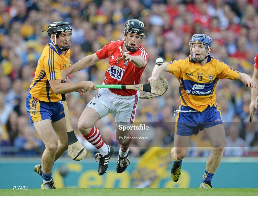 28 September 2013; Shane O'Neill, Cork, in action against Colin Ryan, left, and Podge Collins, Clare. GAA Hurling All-Ireland Senior Championship Final Replay, Cork v Clare, Croke Park, Dublin. Picture credit: Brendan Moran / SPORTSFILE
