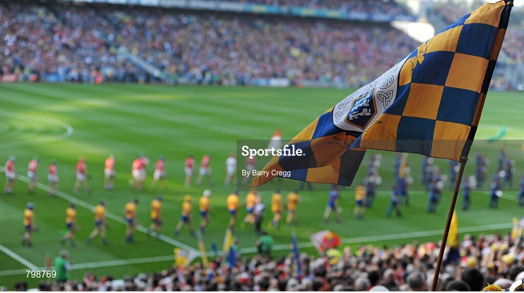28 September 2013; A general view of a Clare flag being waved in tthe crowd as the teams follow the Artane School of Music Band during the parade ahead of the game. GAA Hurling All-Ireland Senior Championship Final Replay, Cork v Clare, Croke Park, Dublin. Picture credit: Barry Cregg / SPORTSFILE