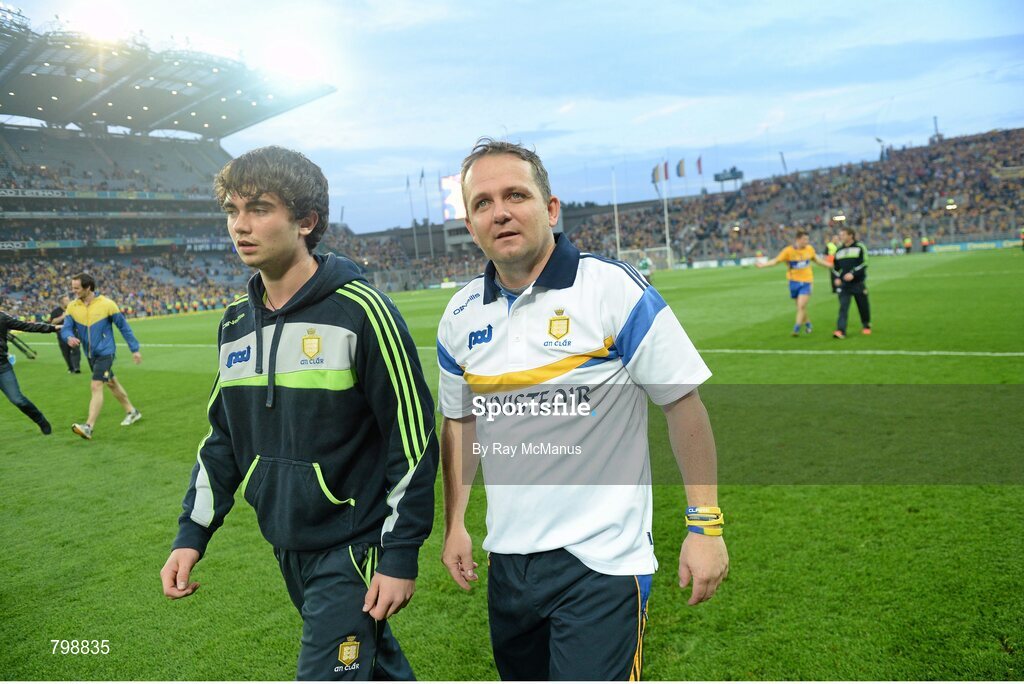 28 September 2013; Davy Fitzgerald, Clare manager, with his son Colm after the game. GAA Hurling All-Ireland Senior Championship Final Replay, Cork v Clare, Croke Park, Dublin. Picture credit: Ray McManus / SPORTSFILE