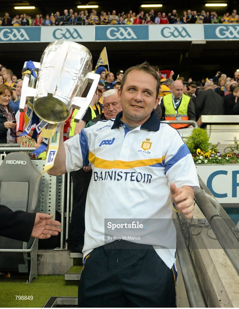 28 September 2013; Clare manager Davy Fitzgerald carries the Liam MacCarthy Cup. GAA Hurling All-Ireland Senior Championship Final Replay, Cork v Clare, Croke Park, Dublin. Picture credit: Ray McManus / SPORTSFILE